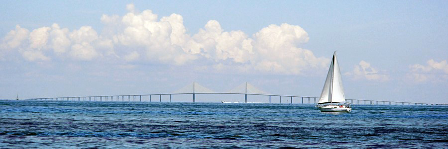 Zig Zag sailboat with the Sunshine Skyway in the background